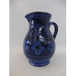A European pottery jug, 8 1/2" high.