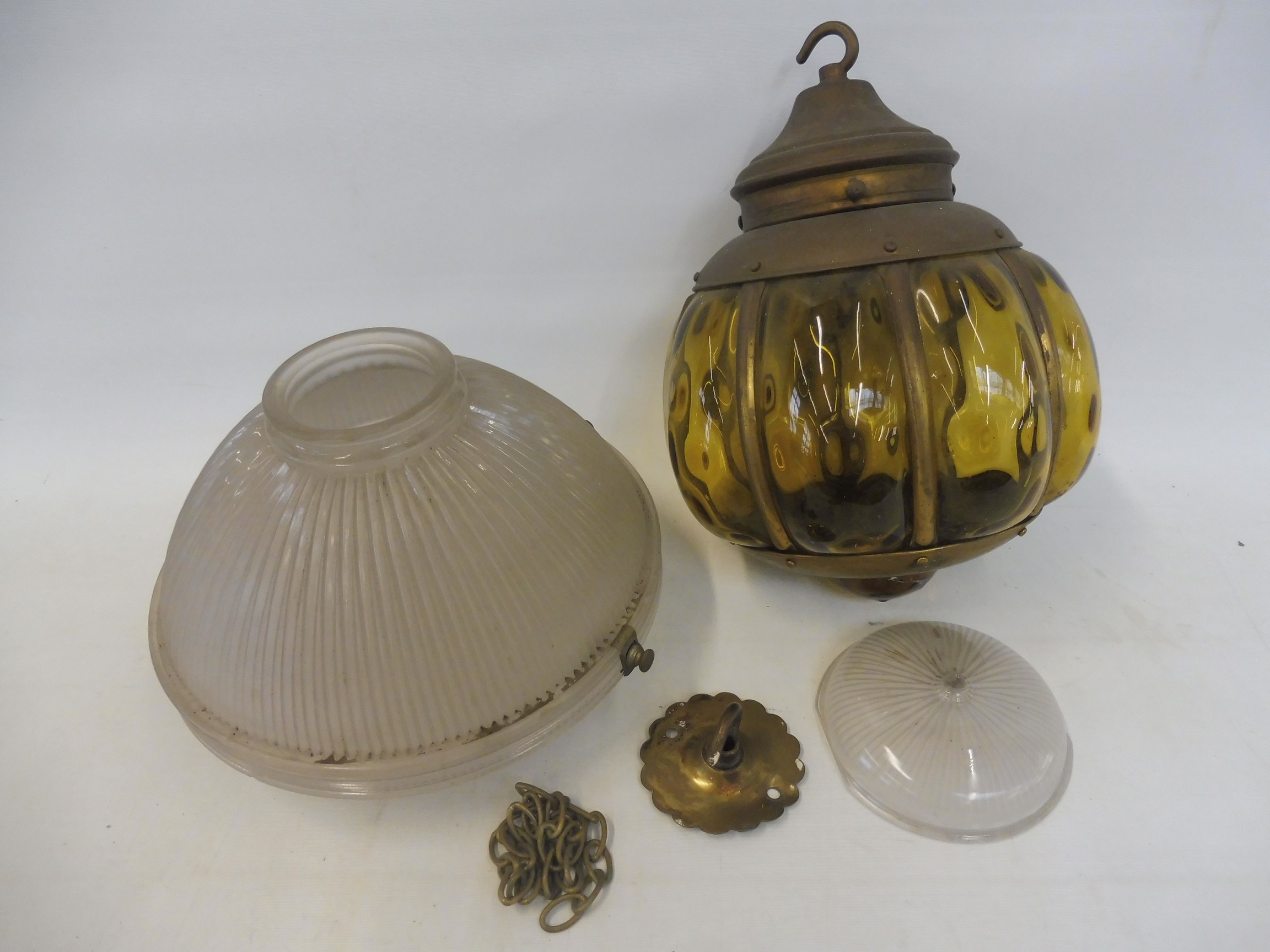 An early 20th Century ribbed glass light shade plus a brass framed hanging light.