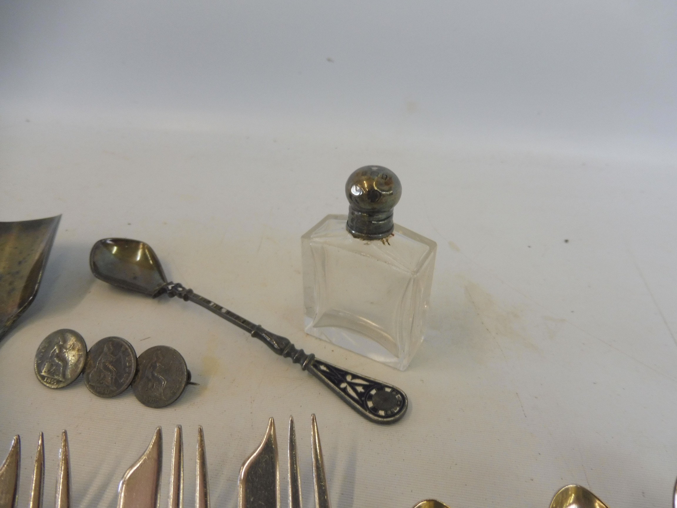 A boxed silver topped scent bottle, a silver cased propelling pencil, an enamelled spoon, a pair - Image 2 of 5
