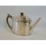 A Georgian silver teapot of oval form, with horn finial and handle, by Hester Bateman, London 1783.