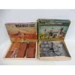 Two boxed Timpo forts, Wild West and Medieval castle, unchecked.