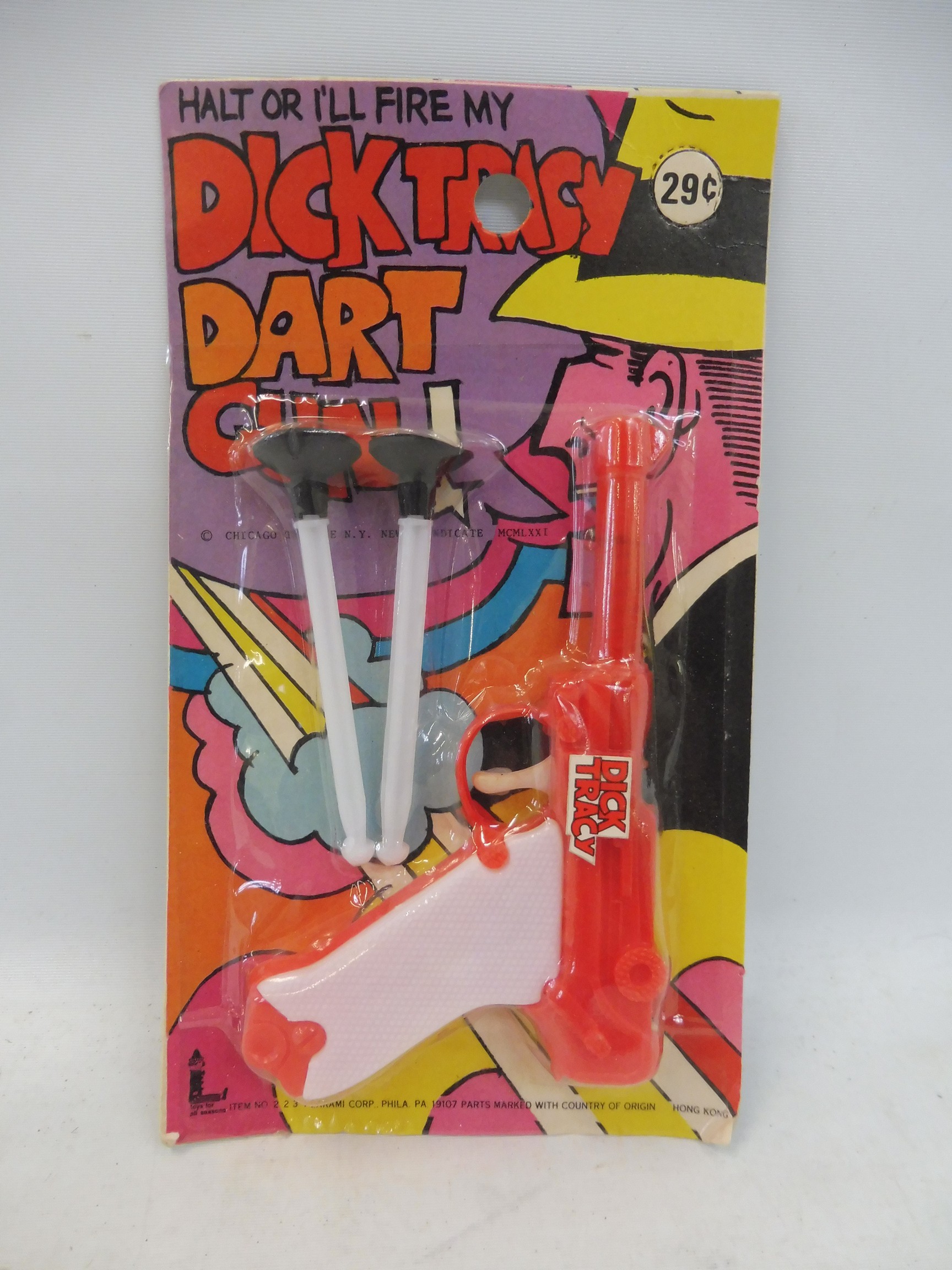 A rare carded Dick Tracey dart gun, 29 cents on packet.