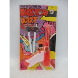 A rare carded Dick Tracey dart gun, 29 cents on packet.