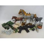 A box of mixed plastic toys to include Wild West horses etc.