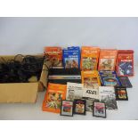 An Atari computer games system with numerous ontrollers etc. plus 13 games to include Asteroids,