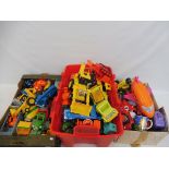 A quantity in three tubs of Bob The Builder tractors, accessories etc.