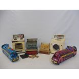 A selection of various toys to include two Japanese tinplate Santa Fe locomotives, plus others.