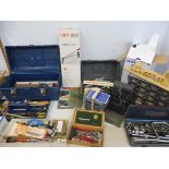 A good selection of modelmaking accessories, tools, brushes, vices etc. some in cabinets.