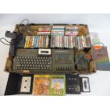 A selection of retro gaming, Sinclair computer joysticks, cassettes etc. unchecked.