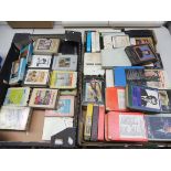 A large collection of 8-track cassettes to include Beatles and others.