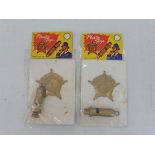 Two early Hong Kong police badges and whistles.