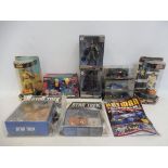 A quantity of modern Batman, Star Trek, Star Wars and similar collectible figures.