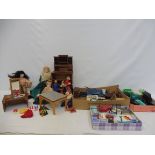 A quantity of dolls house furniture, celluloid dolls etc.