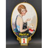 A rare Carreras Black Cat cigarettes pictorial showcard showing a glamorous lady with a black cat on