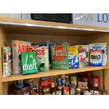 A collection of assorted packaging from a museum, mainly soap and washing products.