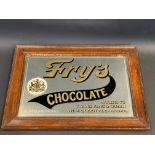 A Fry's Chocolate advertising mirror, in original stamped frame, 21 1/2 x 15 1/2".