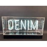 A Denim neon lightbox, by repute from Top Shop, 26 1/4" w x 14 3/4" h x 6" d.