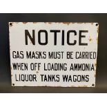 A Notice enamel sign 'gas masks must be carried...', 12 x 9".