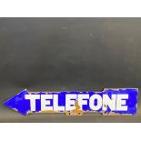 A Telefone double sided directional arrow enamel sign, 25 1/2 x 5 1/2".