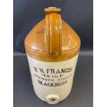A large stoneware flagon for W.H.Francis & Co. Brewery Street, Blackburn, 17 1/2" h.