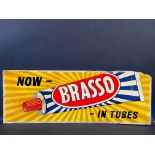 A Brasso hardboard advertising sign, 48 x 17 1/2".