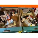 A quantity of packaging, products and containers from a museum display of a barber/hairdresser.