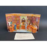 A C.W.S. cardboard model of a shop, 13 3/4" w x 8" h x 4" d.