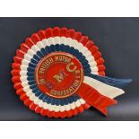 A British Motor Corporation BMC fibreglass rosette, 19 1/2 x 23 1/2".