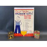 A C.W.S. Custard Powder tin, a Lyons' Custard Powder tin and a hanging showcard for Sailor Boy