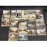 A selection of assorted early postcards, mostly social history, street scenes, Louis Wain etc.