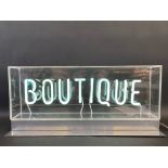 A Boutique neon lightbox, by repute from Top Shop, 27 1/2" w x 12" h x 8" d.