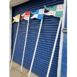 Four medieval style banqueting hall flags on poles made from hardboard.