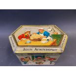 A John Atkinson Easter Fayre tin 1927, decorated with nursery rhyme scenes.