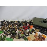 A large quantity of Action Man accessories, guns etc. plus an original tank.