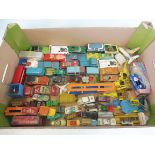 A tray of mainly Corgi and Dinky playworn die-cast vehicles.