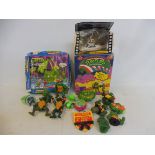 A selection of Teenage Ninja Mutant Turtles, boxed and loose, box poor, plus a James Bond Lotus, box