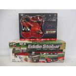 A boxed Eddie Stobart radio-controlled 1.18th scale car and a remote controlled X-Cam quadcopter.