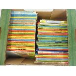 A box of original Ladybird books.
