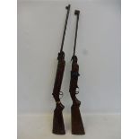 Two fairground rifle range guns.