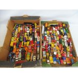 A large quantity in two trays of die-cast vehicles to include Lesney, Matchbox etc. all playworn.