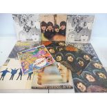 Beatles: 10 LPs and a George Harrison LP, predominantly early pressings on the yellow Parlophone