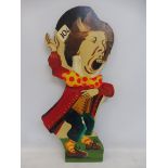 A hand painted fairground sign in the form of a Mad Hatter, 14 x 31 1/2".