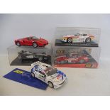 A small selection of die-cast rally and Formula 1.