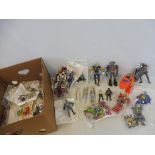 A collection of plastic action figures, generally in excellent condition - Batman, Transporters