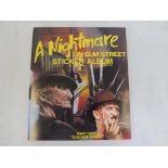 An unused ex-shop stock Knightmare on Elm Street sticker album.