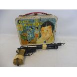 A gun and telescope from the television series The Saint, plus an American lunchbox from the