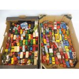 A large quantity in two trays of die-cast vehicles to include Lesney, Matchbox etc. all playworn.