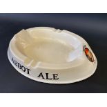 An Abbot Ale oval ashtray, by Wheeler Ceramics, 11 1/2" w.