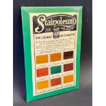 A small celluloid showcard advertising Stainoleum stain and varnishes, 5 3/4 x 8 1/2".