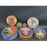 A collection of circular lidded chocolate boxes including Cadbury's.